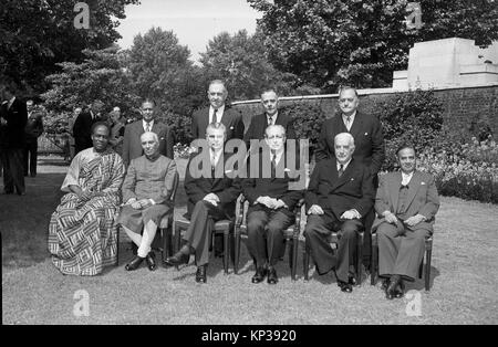 Commonwealth Prime Ministers attending the British Commonwealth Prime Ministers' Conference at 10 Downing Street 1957. LtoR seated  Dr. Kwame Nkrumah, Prime Minister of Ghana; Jawaharlal Nehru, Prime Minister of India; Canadian Prime Minister John Diefenbaker; British Prime Minister Harold MacMillan; Australian Prime Minister Robert Gordon Menzies; and Huseyn Shaheed Suhrawardy, Prime Minister of Pakistan. LtoR standing M.W.H. DeSilva, Ceylon Justice Minister; Thomas L. McDonald, New Zealand External Affairs Minister; Eric Louw, South African External Affairs Minister; and Sir Roy Welensky, Pr Stock Photo