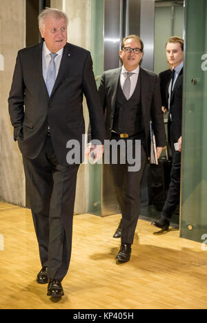 Berlin, Germany. 13th Dec, 2017. Horst Seehover (C), chairman of the Christian Social Union in Bavaria (CSU) and Bavaria's Premier, and Alexander Dobrindt, the state party group leader of the CDU, arrive at the Jakob-Kaiser-Haus in the German Bundestag in Berlin, Germany, 13 December 2017. The party and faction leaders of the Christian Democratic Union of Germany (CDU), the Christian Social Union in Bavaria (CSU) and the Social Democratic Party of Germany (SPD) meet in order to prepare possible exploratory talks. Credit: Michael Kappeler/dpa/Alamy Live News Stock Photo