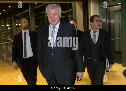 Berlin, Germany. 13th Dec, 2017. Horst Seehover (C), chairman of the Christian Social Union in Bavaria (CSU) and Bavaria's Premier, and Alexander Dobrindt, the state party group leader of the CDU, arrive at the Jakob-Kaiser-Haus in the German Bundestag in Berlin, Germany, 13 December 2017. The party and faction leaders of the Christian Democratic Union of Germany (CDU), the Christian Social Union in Bavaria (CSU) and the Social Democratic Party of Germany (SPD) meet in order to prepare possible exploratory talks. Credit: Michael Kappeler/dpa/Alamy Live News Stock Photo