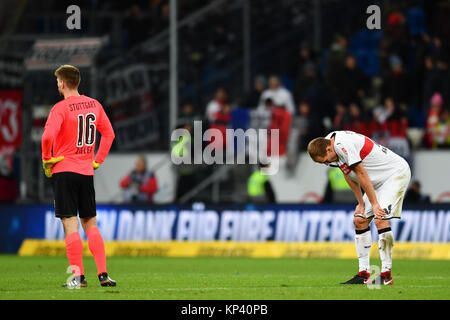 Sinsheim, Germany. 13th Dec, 2017. Stuttgart's goalkeeper Ron-Robert Zieler (L) and Stuttgart's Holger Badstuber stand on the pitch after the German Bundesliga soccer match between 1899 Hoffenheim and VfB Stuttgart in the Rhein-Neckar-Arena in Sinsheim, Germany, 13 December 2017. Hoffenheim won 1-0. Credit: Uwe Anspach/dpa/Alamy Live News Stock Photo