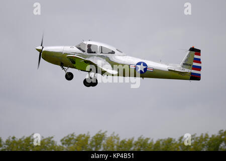 North American L-17A Navion plane taking off at the Goodwood Revival 2017 Stock Photo