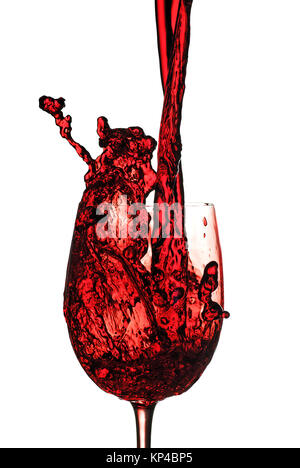 red wine being poured in to a wine glass from a height Stock Photo