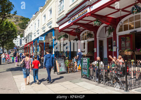 north wales llandudno wales llandudno town centre Mostyn street with the London pub and tourists llandudno gwynedd north wales uk gb eu europe Stock Photo