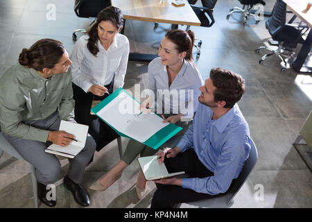 Happy group of executives having meeting in the office Stock Photo