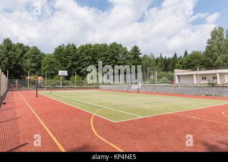 Outdoor playground for tennis, volleyball and football. Net on the playground Stock Photo