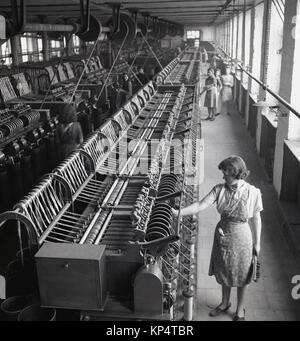 Historical, 1950s, female operatives working on the factory floor at ...