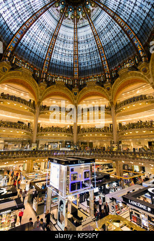 PARIS, FRANCE - JUN 18, 2015: Interior view of the Galeries Lafayette shopping mall in Paris. Stock Photo