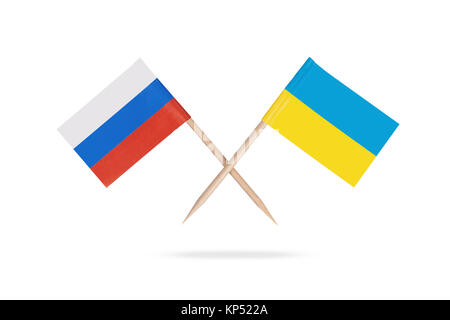 Crossed mini flags Ukraine and Russia Stock Photo