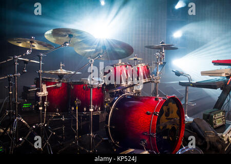 drum set on stage and light background; empty stage with instruments ready for performance Stock Photo