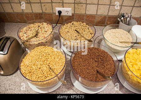 Many flavor cornflake crispy for people eating with milk or yogurt in restaurant room at resort hotel at Pfunds in morning time in Tyrol, Austria Stock Photo