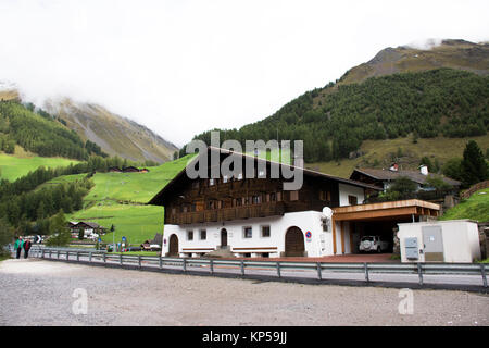 Travelers people walking and visit Vernagt-Stausee Lake in Vernago village at foot of the hill of otztal alps in Schnals city on September 2, 2017 in  Stock Photo