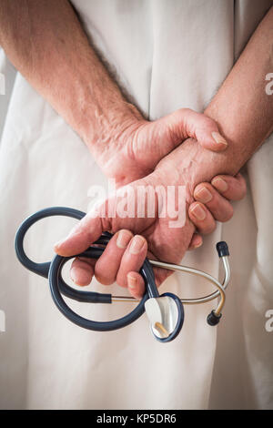 Doctor holding a stethoscope. Stock Photo