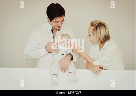 Familie mit Baby - family Stock Photo