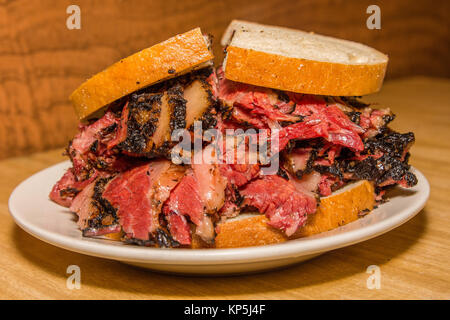 close up of large pastrami sandwich on rye bread Stock Photo
