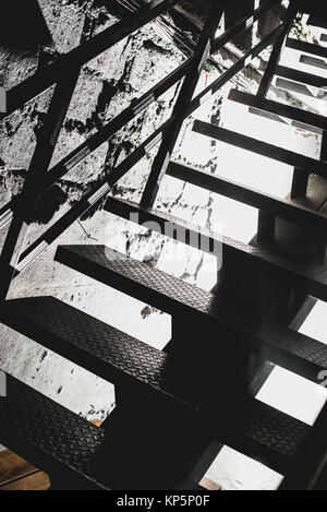 The morning sun shines on the stairs in the house. Stock Photo