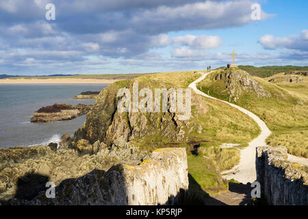 Path leading from Twr Mawr lighthouse to stone cross on Llanddwyn Island, Isle of Anglesey, North Wales, UK, Britain Stock Photo