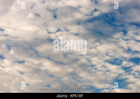 Big Sky Blue White Puffy Clouds Rolling Along Stock Photo