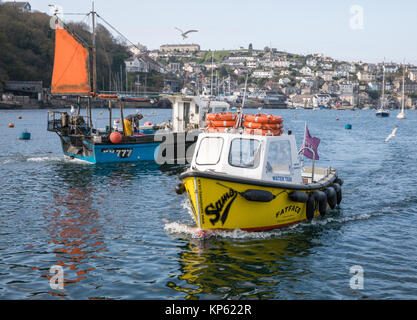 Water taxi serving the sheltered harbour of Fowey between the town and Polruan on the opposite shore - Cornwall UK Stock Photo