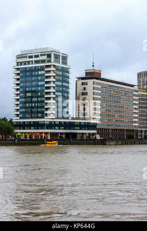 The River Thames at Millbank, London, UK, looking across to the Albert Embankment Stock Photo