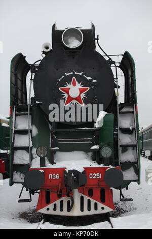 locomotive at a train station in winter,  front view Stock Photo