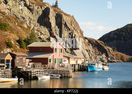 Houses with fishing boats on waterfront of historic Quidi Vidi Village, Newfoundland, Canada. Stock Photo