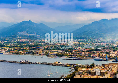 Port of milazzo moor the city and as background the sicilian mountains Stock Photo