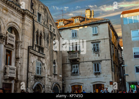 People's Square in old town Split Croatia with Cindro Palace on the left as the sun begins to set in early autumn Stock Photo