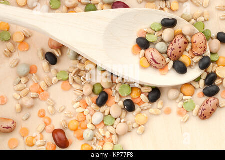assorted beans in wooden spoon Stock Photo