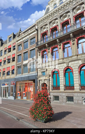 AMSTERDAM-AUGUST 19, 2012. Ancient mansions in Amsterdam city center. Many of the city's ancient mansions dated back to the prosper 17th century. Stock Photo