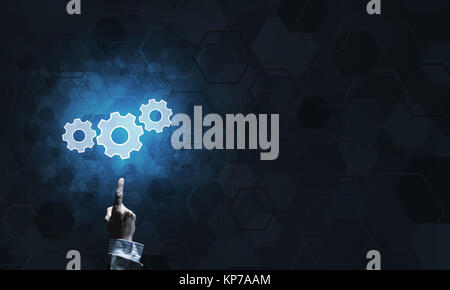 Technology conceptual image with gear digital symbol on dark background Stock Photo