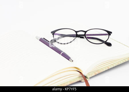 Notebook with pen isolated on white background Stock Photo