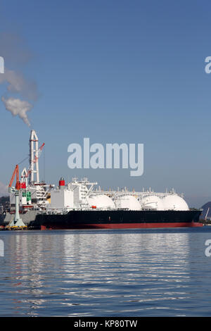 cargo ship docked in the port Stock Photo