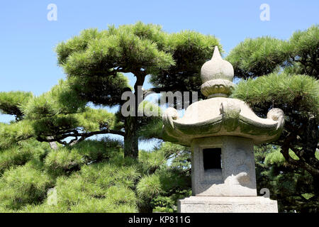 Japanese oriental stone garden lantern Stock Photo