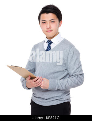 Asian Young businessman hold with clipboard Stock Photo - Alamy