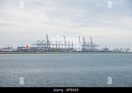 row of harbor cranes Stock Photo