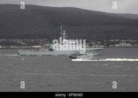 HMS Forth (P222), the first of the Batch 2 River-class patrol vessels of the Royal Navy, passes the UK Border Force's HMC Active on the Firth of Clyde Stock Photo