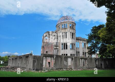 A-bomb dome, a building ruin left behind after the bombing of Hiroshima in World War II. Taken in Hiroshima, Japan. A reminder of war, suffering, pain Stock Photo