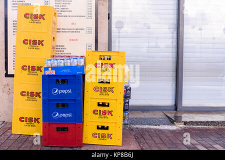 Delivery of Cisk lager, Pepsi and other drinks left outside a bar restaurant in Malta. Stock Photo