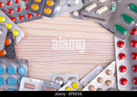 Pills and capsules in aluminum container Stock Photo