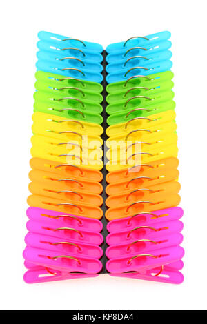 Colorful plastic clothespins on a white background Stock Photo
