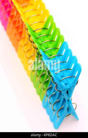 Colorful plastic clothespins Stock Photo