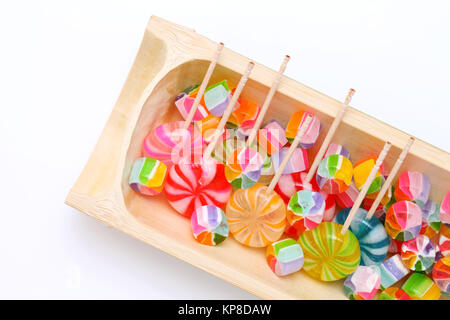 Japanese traditional colorful candies on bamboo plate Stock Photo