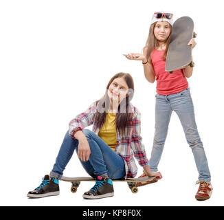 two fashion pretty girls with skateboard, isolated on white Stock Photo