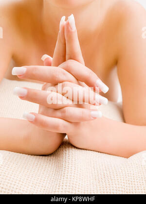 Young woman's french manicure Stock Photo