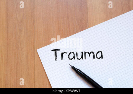 Trauma write on notebook Stock Photo