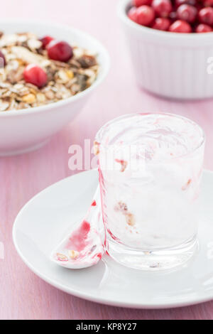 empty glass and dirty spoon after eating Stock Photo