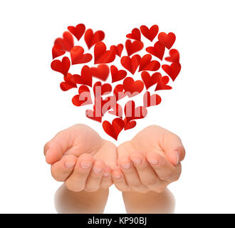 Hearts in heart shape flying over cupped hands of young woman, Valentine's Day, happy Valentines day, love concept, isolated on white background, birthday card, health insurance concept, hearts are made from flower petals Stock Photo