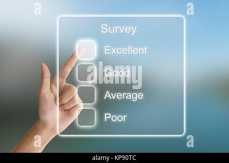 hand pushing survey on virtual screen Stock Photo