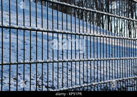 a fence in winter Stock Photo