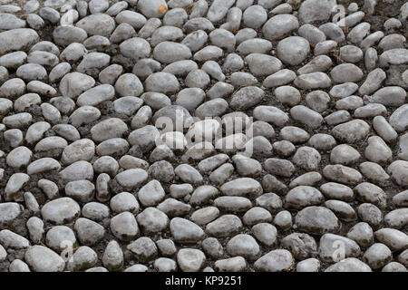 Floor walkway made of small pebbles Stock Photo